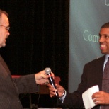 Passing the mic to Mayor Kevin at the Sacramento Convention Center Statewide Law Enforcement Dinner