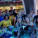 Achiever's Club winners celebrating at the top of Vegas' SkyPod.